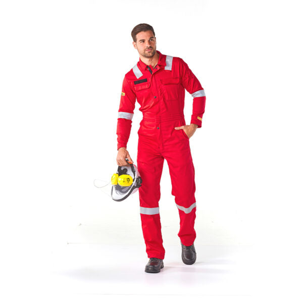 DROMEX Poseidon Red Boilersuit - Hi-Vis Workwear: Man in red protective overall with reflective stripes, holding a hard hat.