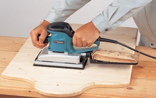 MAKITA BO4900 Finishing Sander: Woodworking Power Tool for Smooth Results. Professional Sander in Use
