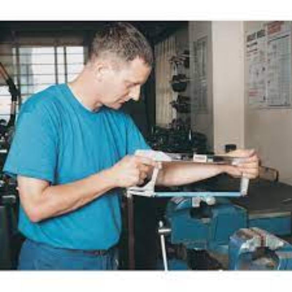 Man using KENNEDY 10\" hacksaw with a 1/2\" 24TPI HSS blade. Hacksaw blades available at chavda.com.