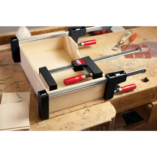 BESSEY parallel clamp clamping a wooden box. UK UNIKLAMP 583-030 108 used in woodworking. Chavda.com