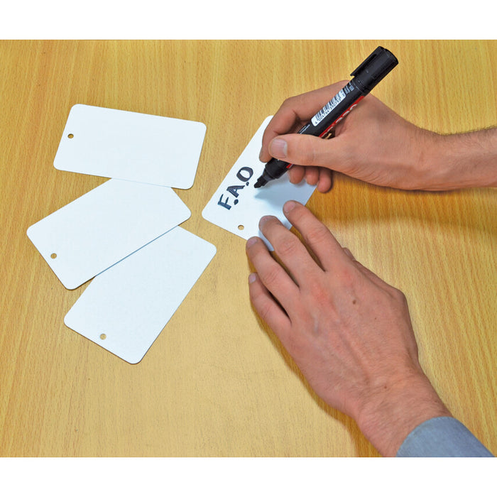 Cromwell Metal Tag Wires: Hand labeling a metal tag with a marker. Identification and labeling solution.