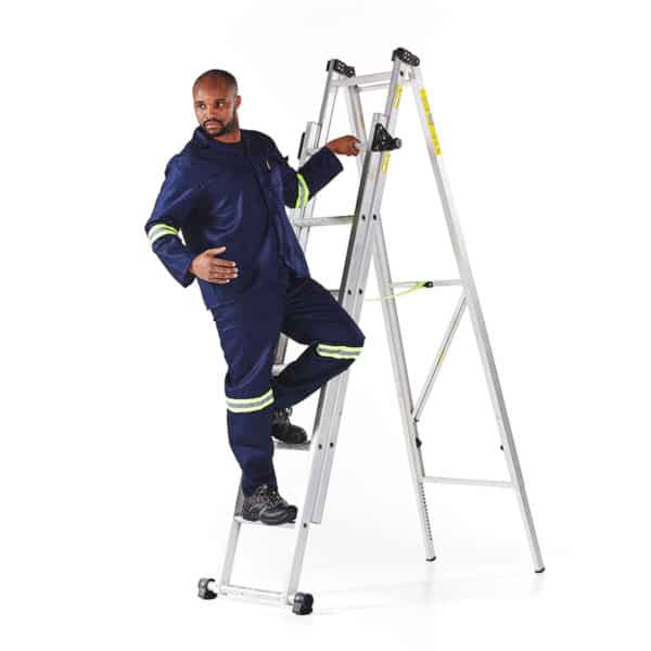 DROMEX CONTI JACKET - Royal Blue Workwear - Man Wearing Size 42 Safety Clothing on Ladder